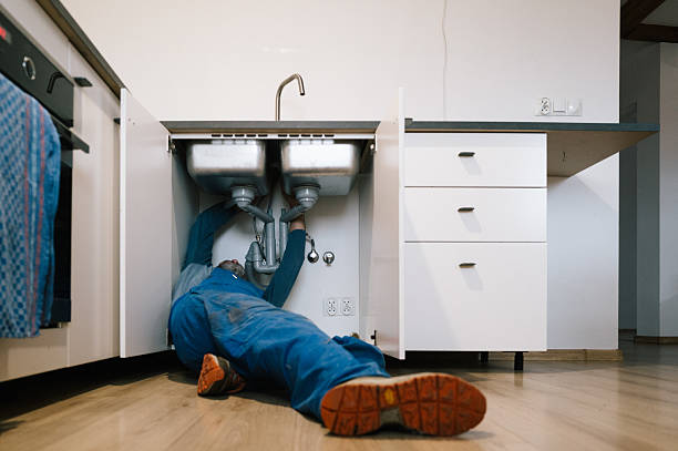 Professional Drain Cleaning technician working in Versailles, PA